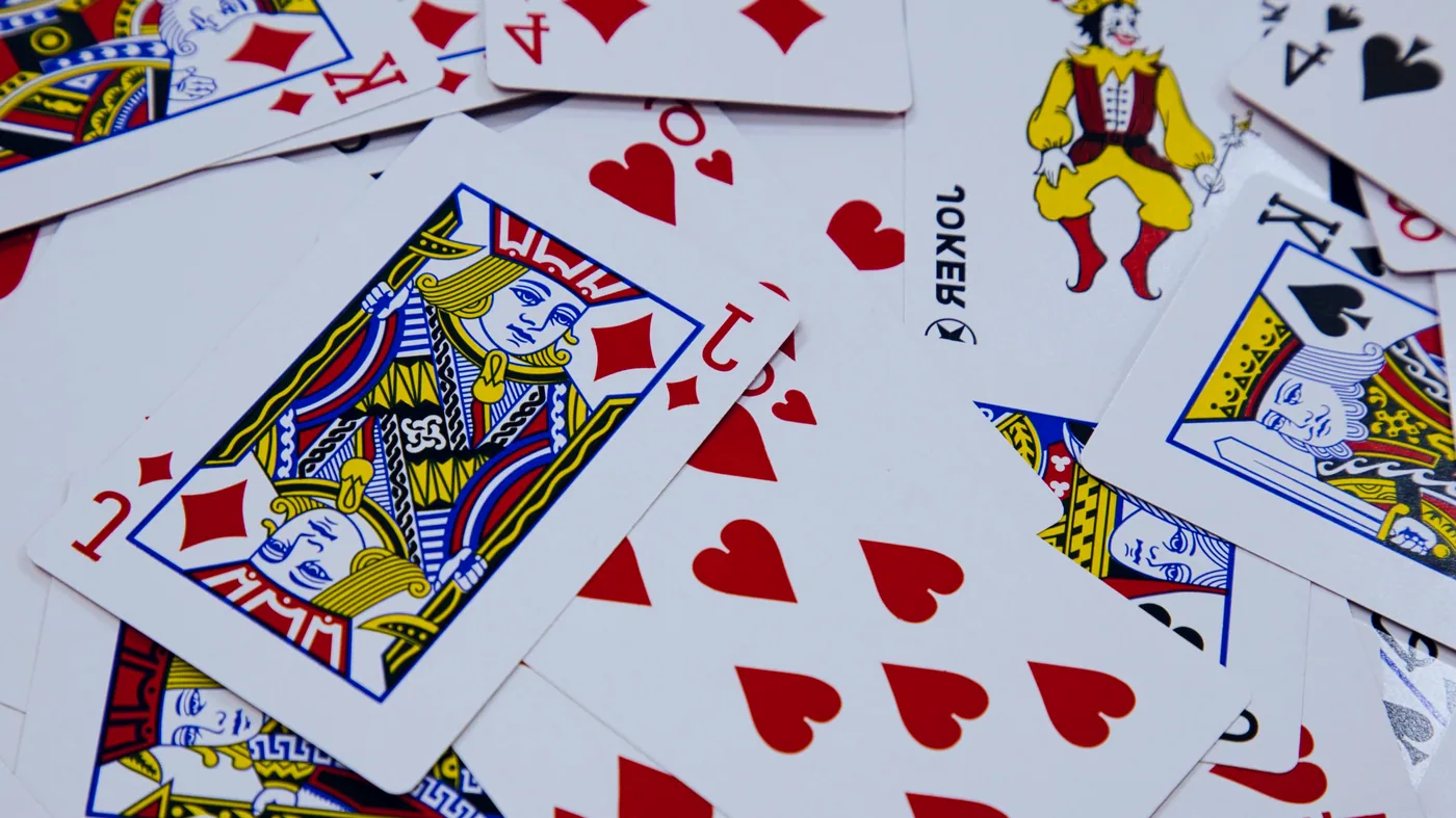 Cards fanned across the table mid-hand
